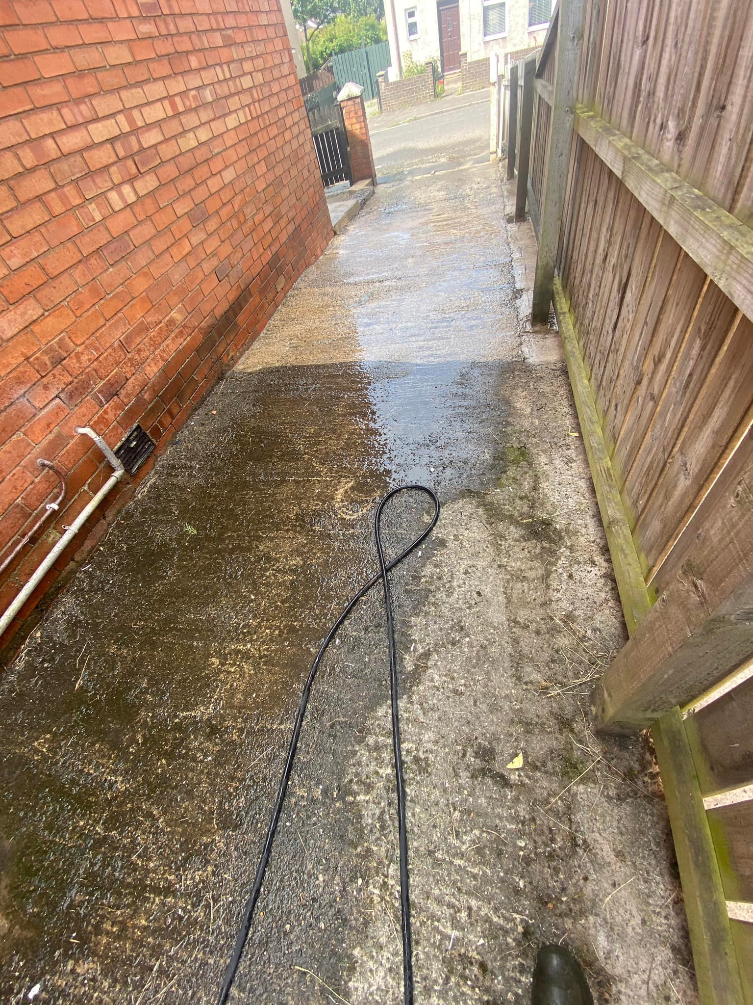 Driveway leading to back garden cleaning powerwashing by Sparkly Clean